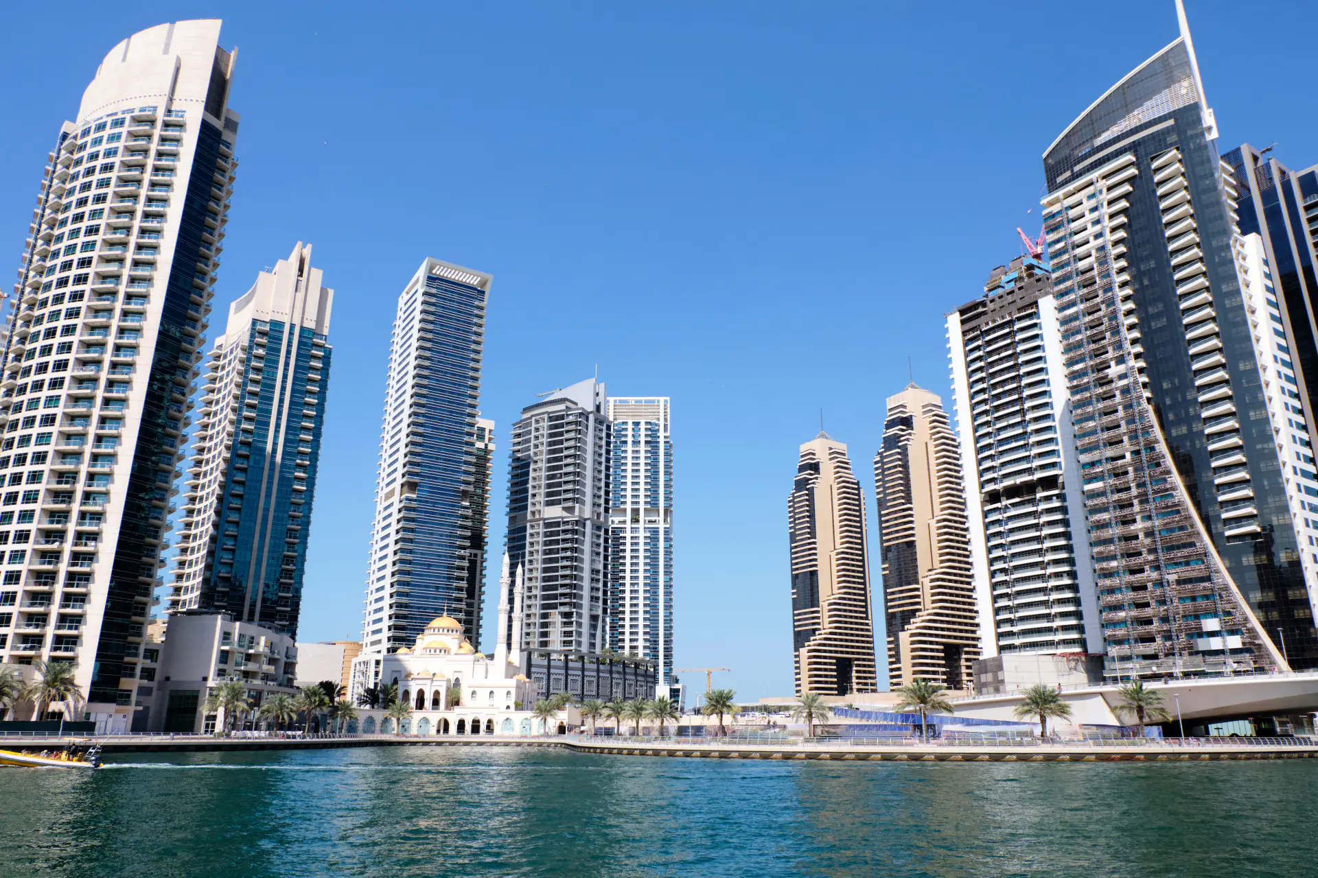 Dubai Marina towers and mosque from the water